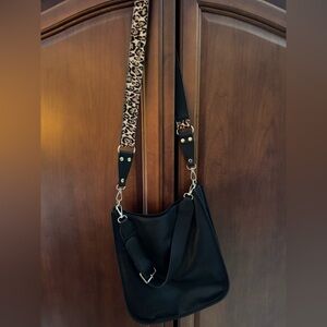Elegant Black Shoulder Bag with Leopard Accent Interchangeable Strap